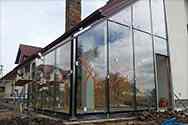 Structure de cadre de parois extérieurs en acier inoxydable satiné avec couverture en verre de sécurité feuilleté